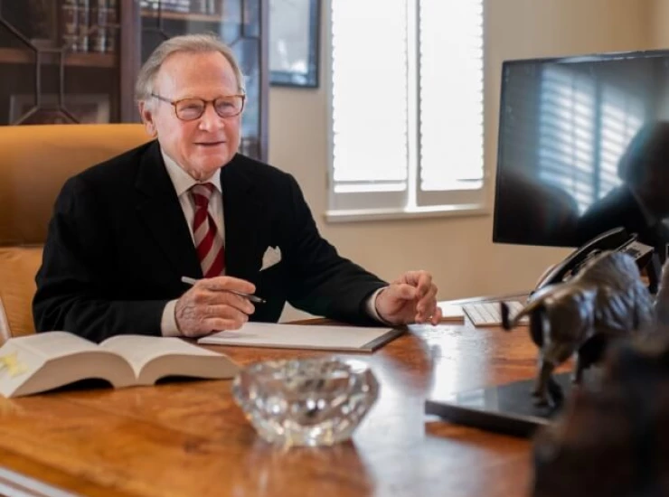 ed-sitting-at-desk